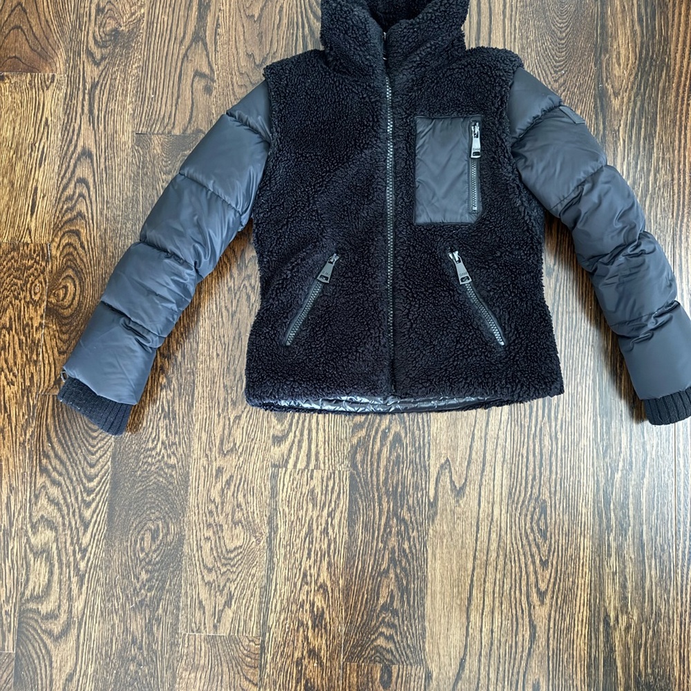 Sam. Coat